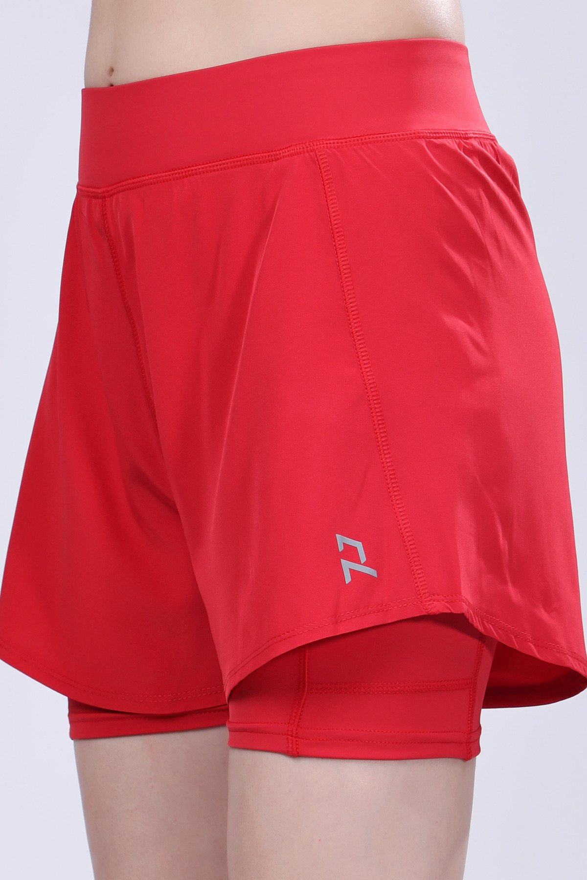 Nightingale in Pitch Black Sports Bra and Cherry Blossom Running Shorts - Image 5