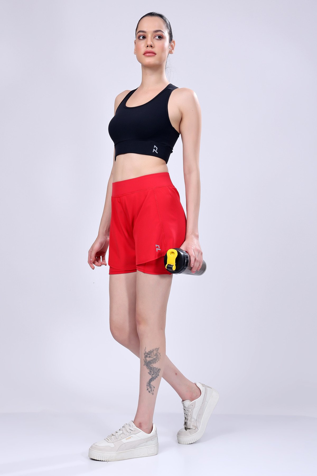Nightingale in Pitch Black Sports Bra and Cherry Blossom Running Shorts - Image 8