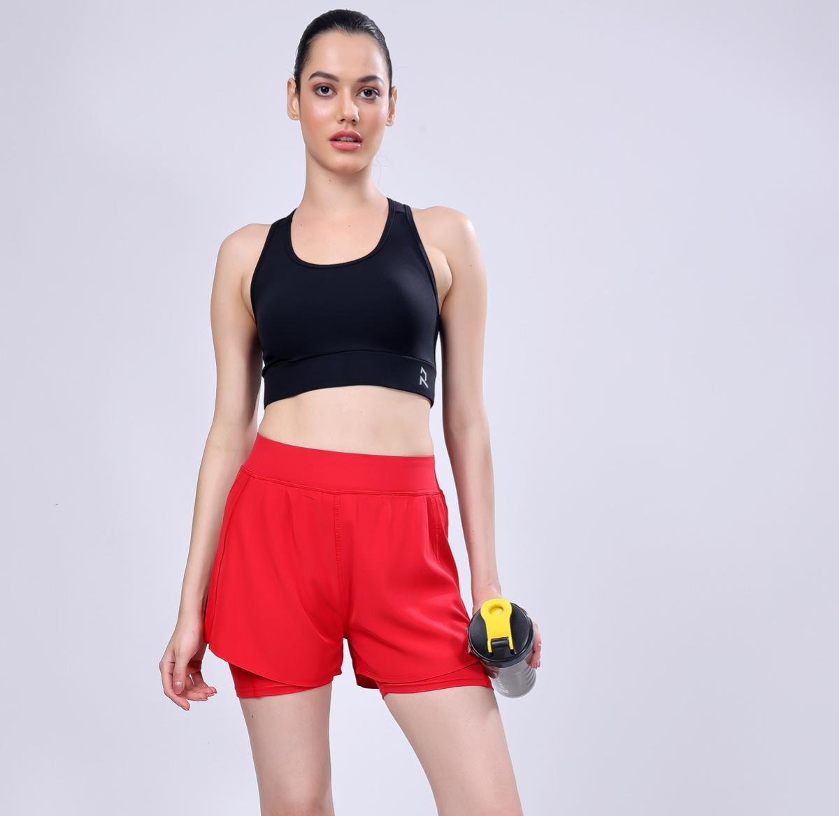 Nightingale in Pitch Black Sports Bra and Cherry Blossom Running Shorts